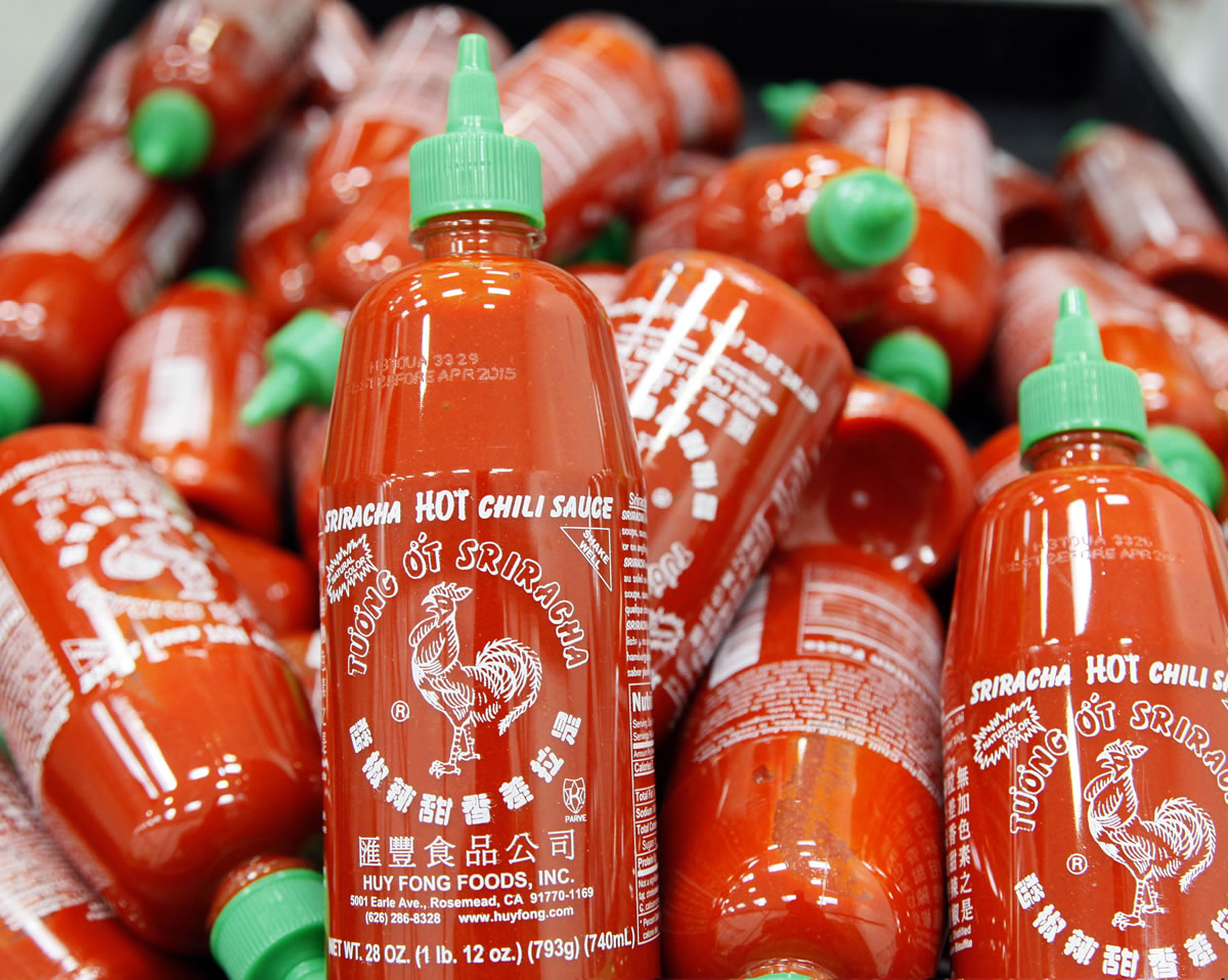 Sriracha chili sauce bottles are produced at the Huy Fong Foods factory in Irwindale, Calif.