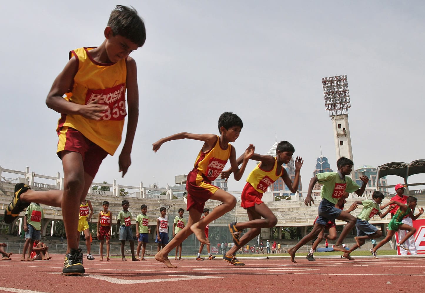 Boys participate in the 100-meter race during the two-day World Athletics Day meet in Bangalore, India, in 2007. An analysis of studies on 250 million children around the world suggests they don't run as fast or as far as their parents did when they were young.  According to research featured at the American Heart Association's annual conference on Tuesday, on average, children 9 to 17 take 90 seconds longer to run a mile than their counterparts did 30 years ago.