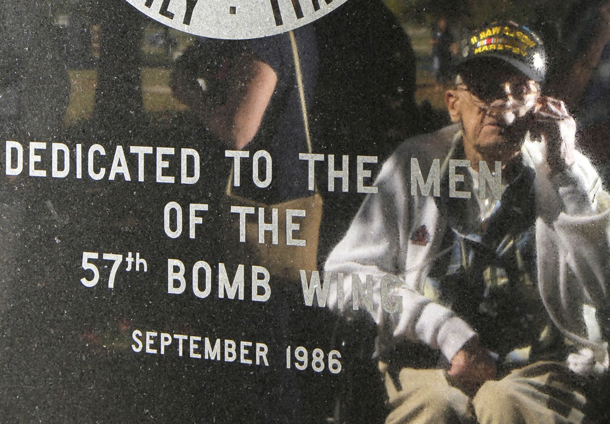 Lenard Wichtowski is reflected in the memorial to the 57th Bomb Wing during a Sept. 27 reunion outside the U.S. Air Force Museum at Wright Patterson Air Force Base in Dayton, Ohio. According to the Department of Veteran Affairs, just a little over 1 million World War II veterans remain. They are in their 80s and 90s, and many are infirm or fragile.