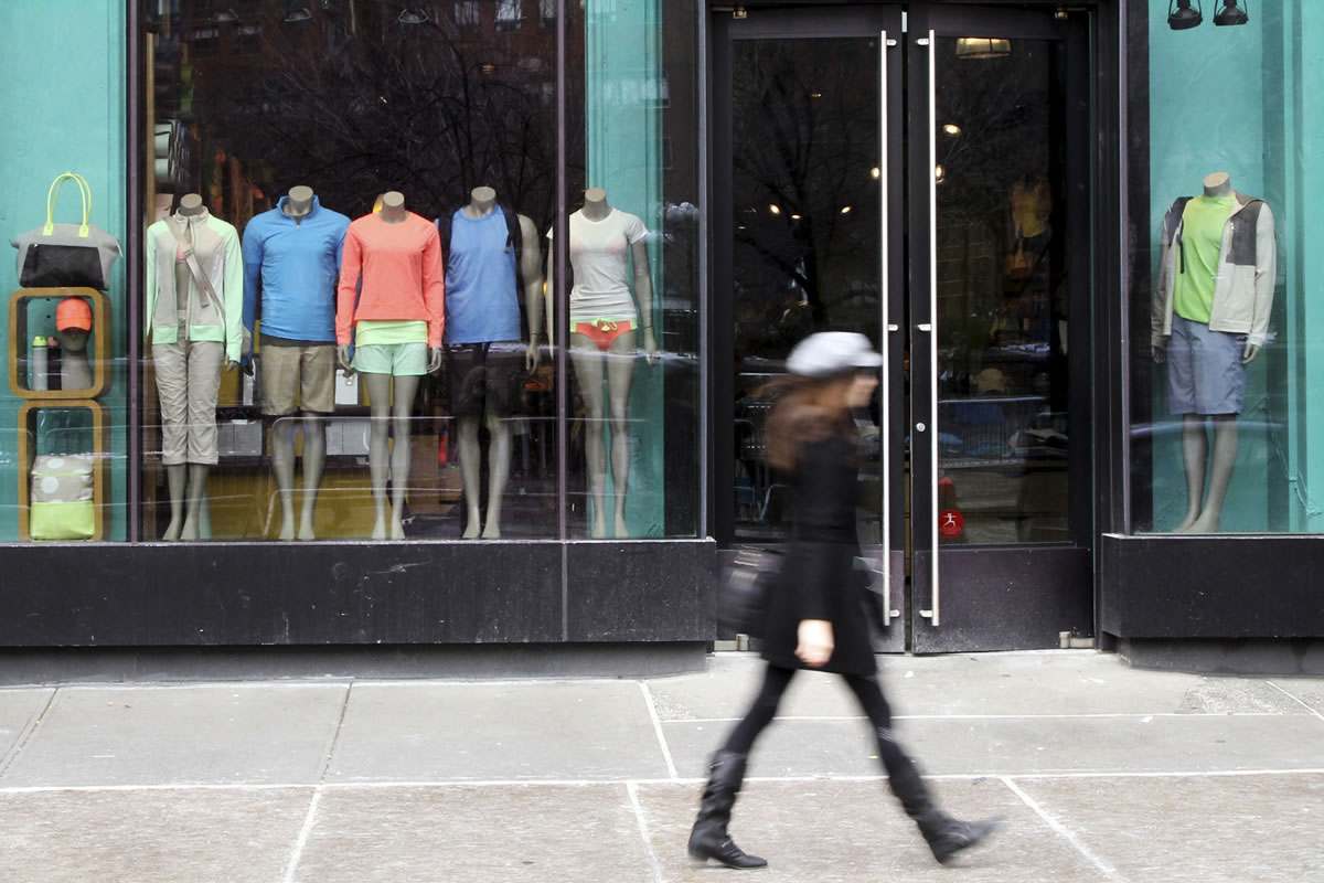 A woman walks past the Lululemon Athletica store at Union Square in New York.