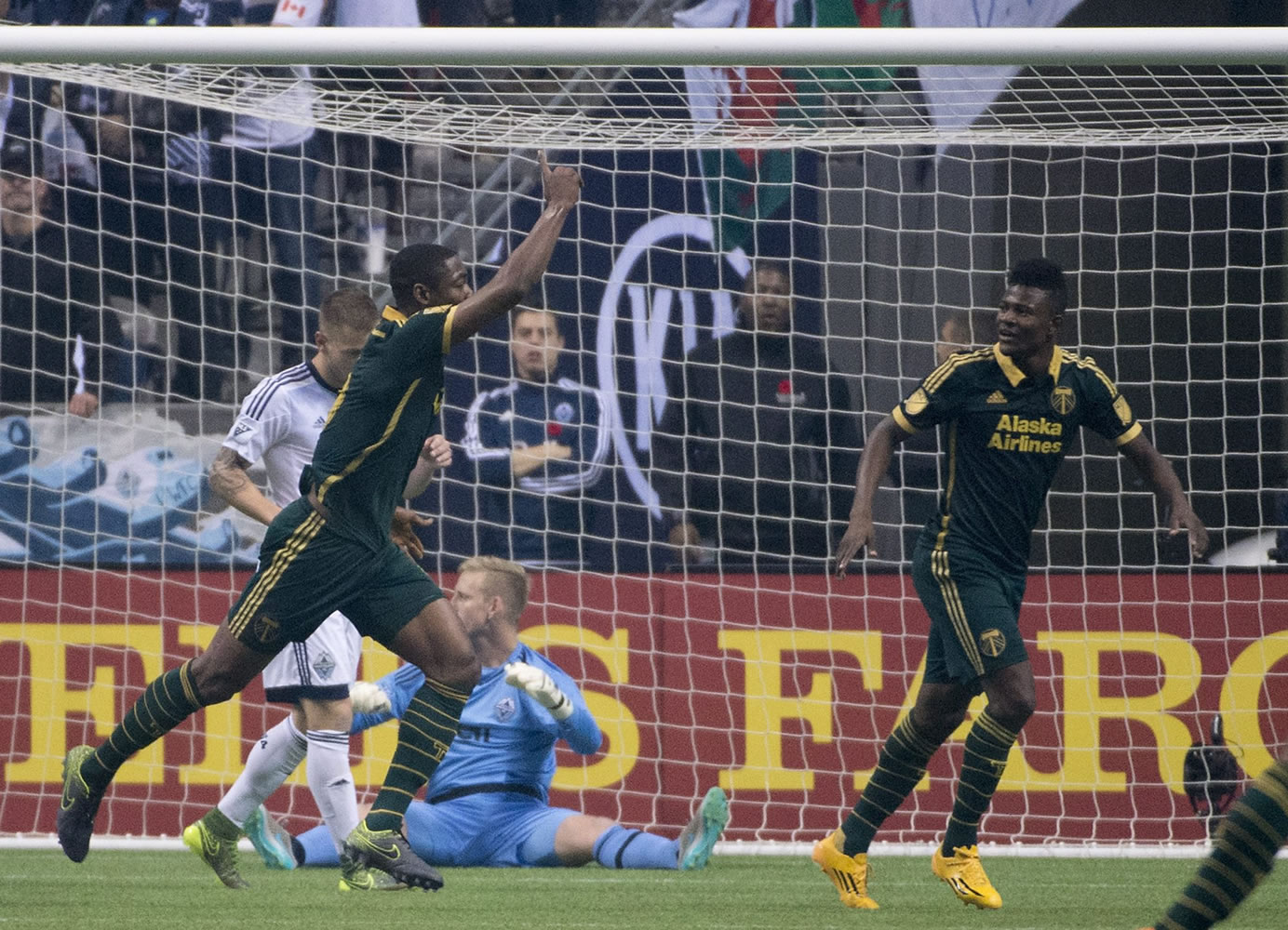 Portland Timbers FC Fanendo Adi (9) celebrates his goal past Vancouver Whitecaps goalkeeper David Ousted (1) during the first half of MLS soccer action in Vancouver, British Columbia, Canada, Sunday, Nov. 8, 2015.