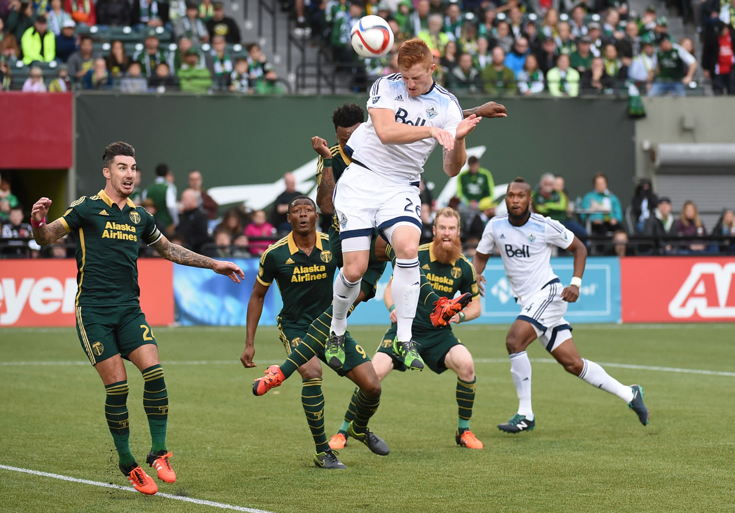 Vancouver Whitecaps defender Tim Parker (26) goes up for a corner kick during the first half of an MLS western conference semifinal soccer match against the Portland Timbers in Portland, Ore., Sunday, Nov. 1, 2015. .