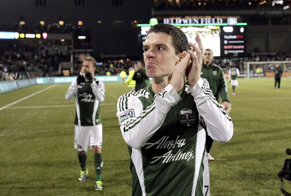 Portland Timbers midfielder Will Johnson applauds fans as he walks off the field after a second game of the Western Conference finals in the MLS Cup soccer playoffs against Real Salt Lake, Sunday, Nov. 24, 2013, in Portland, Ore. Real Salt Lake won 1-0.