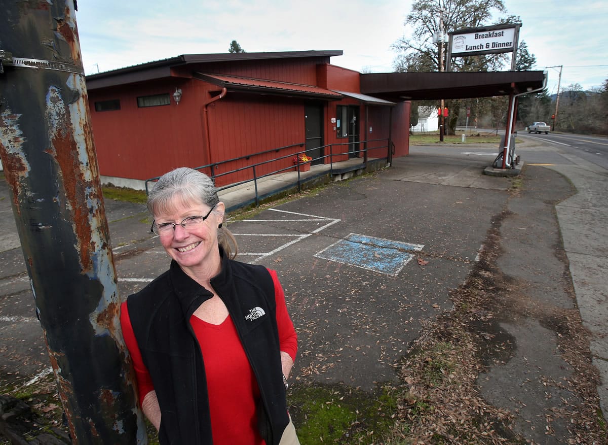 Laurie Smart, seen Dec. 31, is one of the three investors who see promise in the old Tomahawk Sports Bar and Grill in Marcola, Ore.