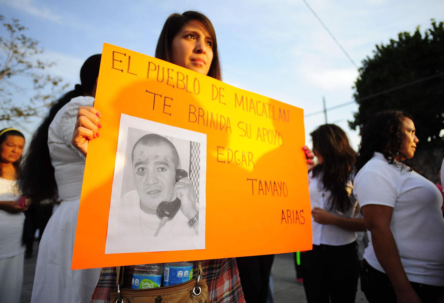 A woman holds up a sign showing a photo of Texas death-row inmate Edgar Tamayo that reads in Spanish &quot;The town of Miacatlan offers you our support, Edgar Tamayo Arias&quot; during a protest demanding Tamayo's pardon in his hometown of Miacatlan, Mexico, on Sunday.
