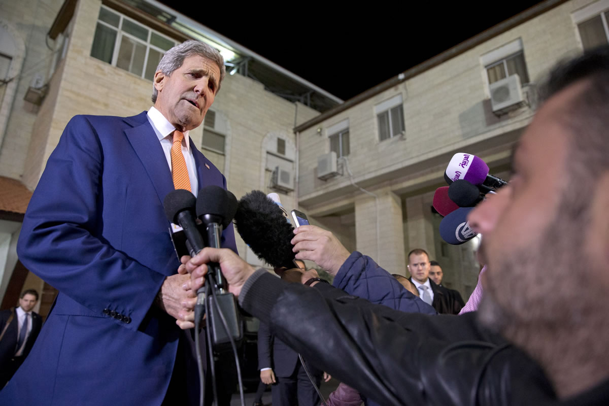 Secretary of State John Kerry makes impromptu remarks to the media Tuesday after meeting with Palestinian President Mahmoud Abbas in Ramallah.