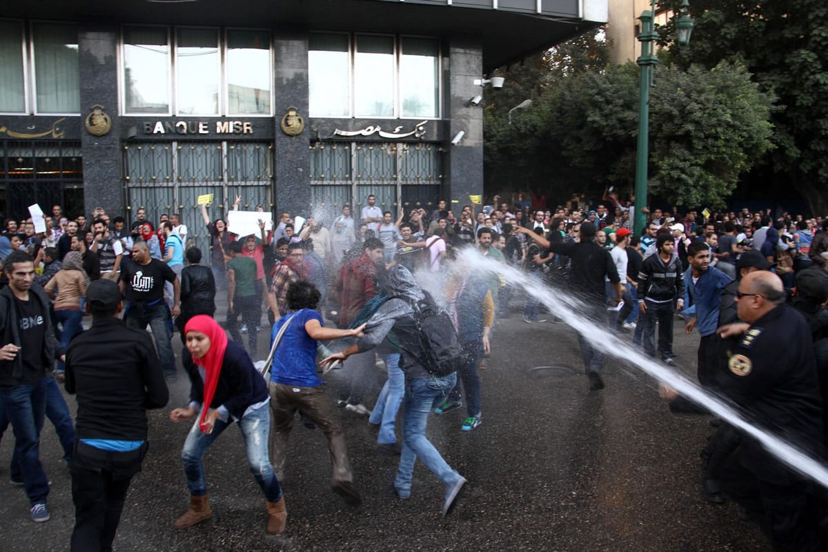Egyptian police fire water cannons to disperse a protest by secular anti-government activists in Cairo on Tuesday.