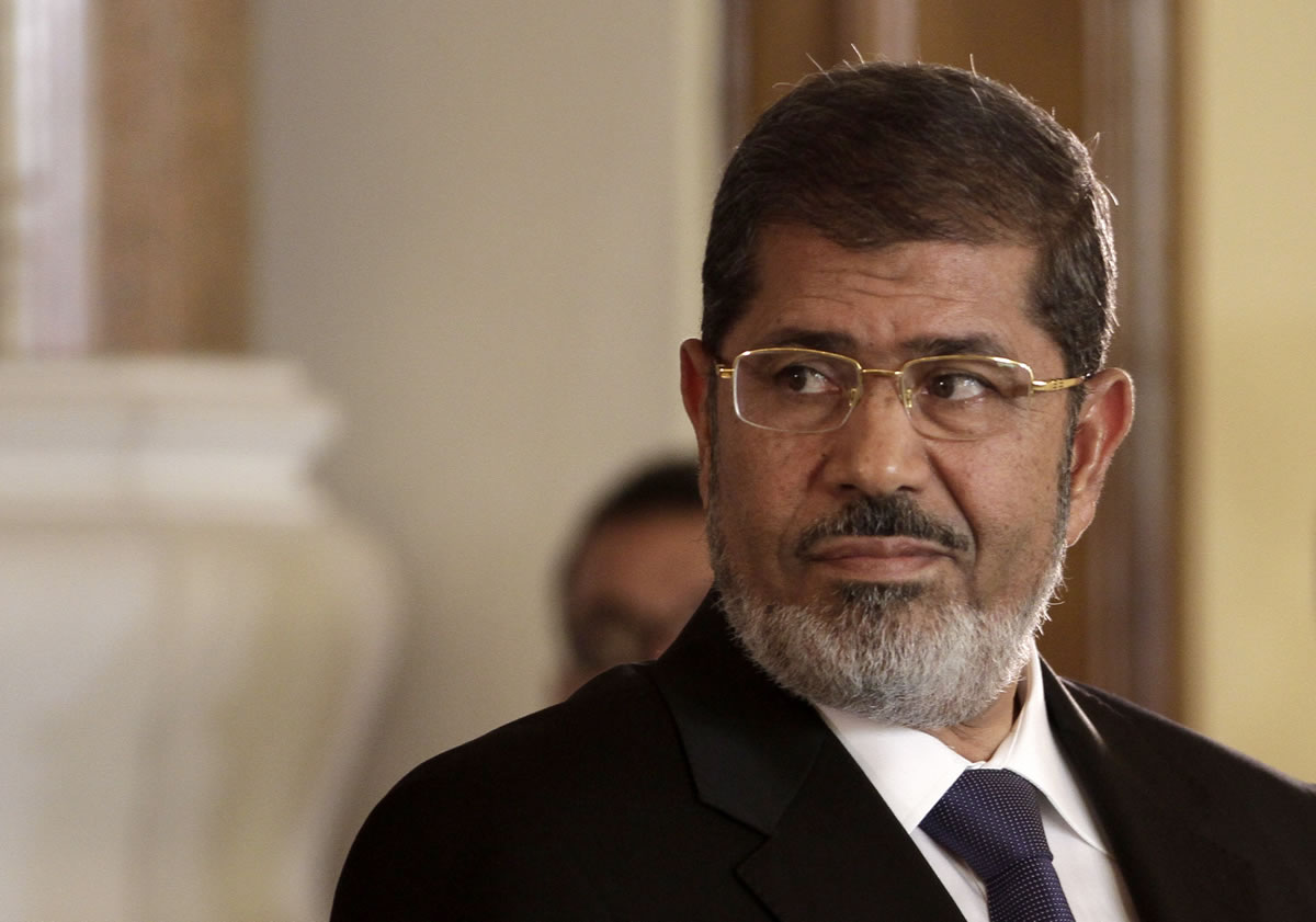 Egyptian President Mohammed Morsi holds a joint news conference with Tunisian President Moncef Marzouki, unseen, at the Presidential palace in Cairo, Egypt, in 2012.
