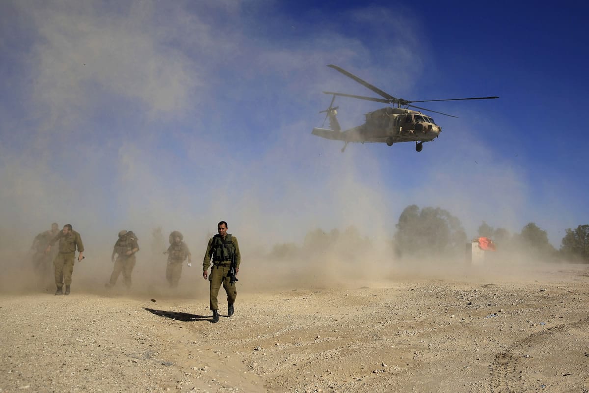 An Israeli military helicopter takes off to evacuate a civilian shot near the Israel and Gaza border Tuesday.
