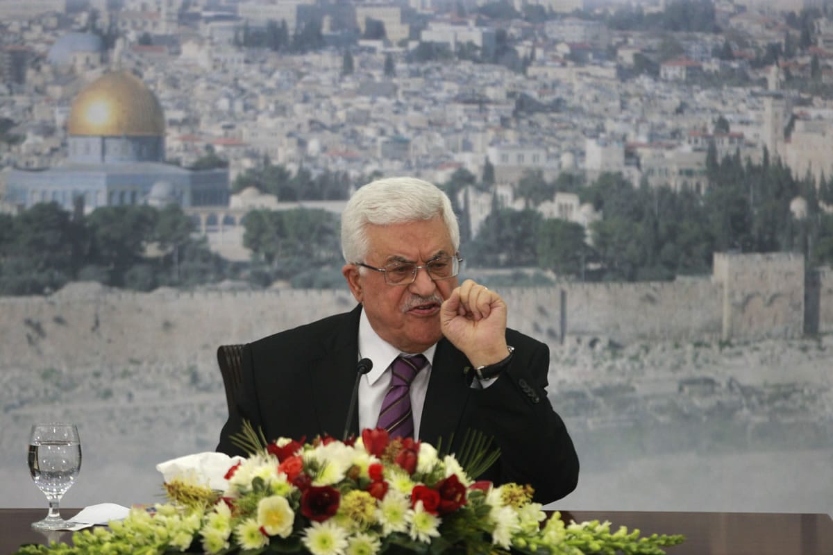 Palestinian President Mahmoud Abbas speaks Saturday to a meeting of Jerusalem activists at his Ramallah compound.