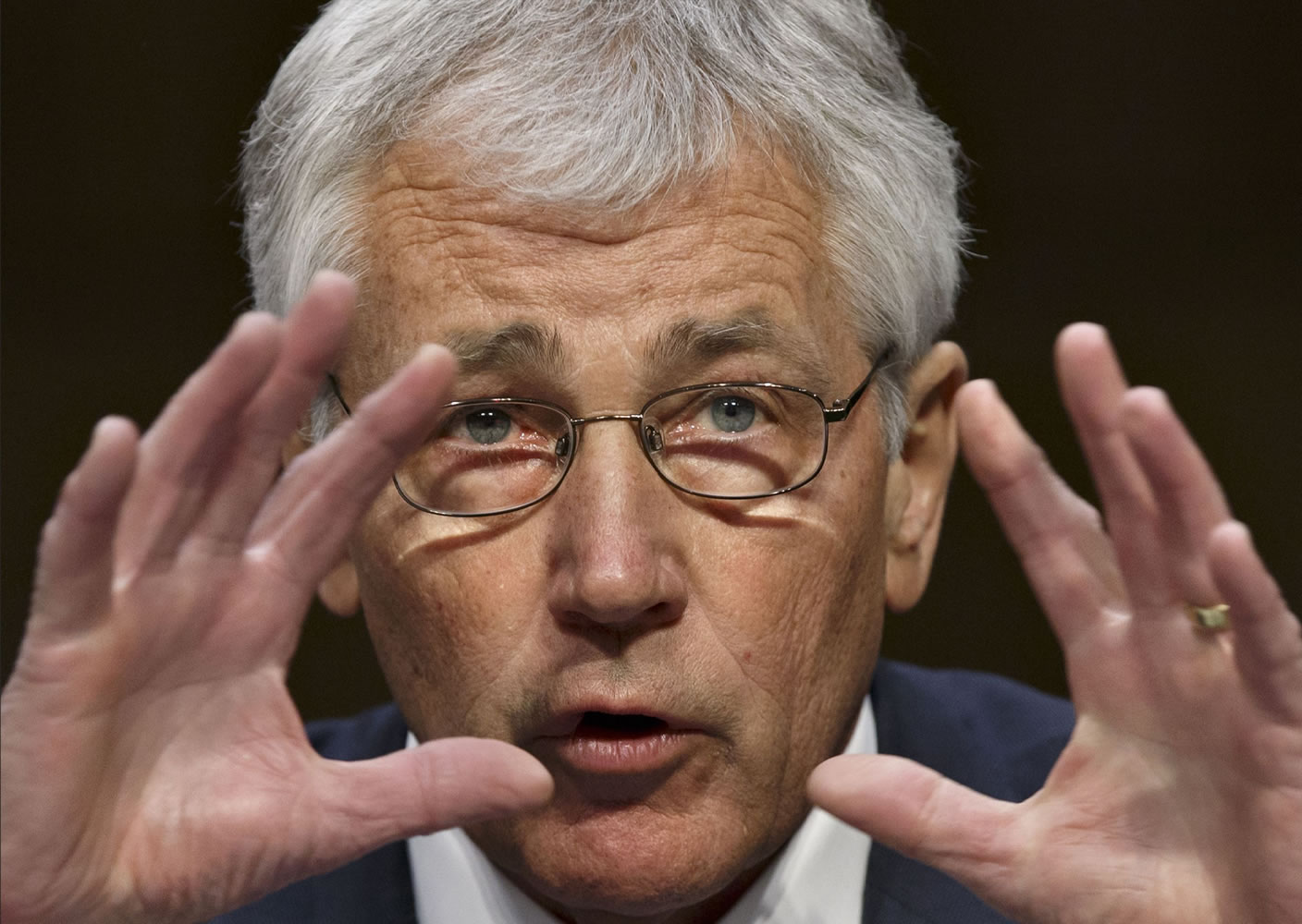 Defense Secretary Chuck Hagel testifies on Capitol Hill in Washington on Wednesday before the Senate Armed Services Committee hearing on the Defense Departmentis budget request for fiscal year 2015. In response to Russia's takeover of Ukraine's Crimean Peninsula, Hagel said the U.S.