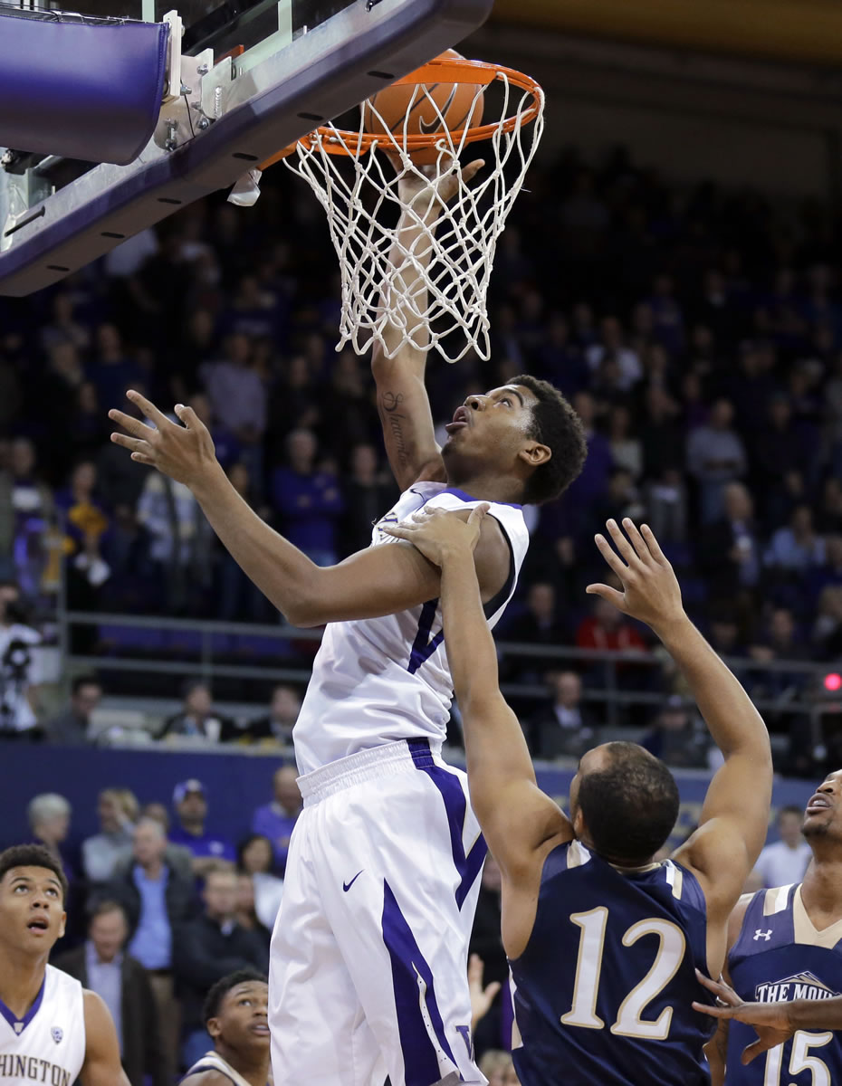 Washington forward Marquese Chriss shoots bove Mount St. Mary&#039;s guard Charles Glover (12) during the first half of an NCAA college basketball game, Thursday, Nov. 19, 2015, in Seattle. (AP Photo/Ted S.