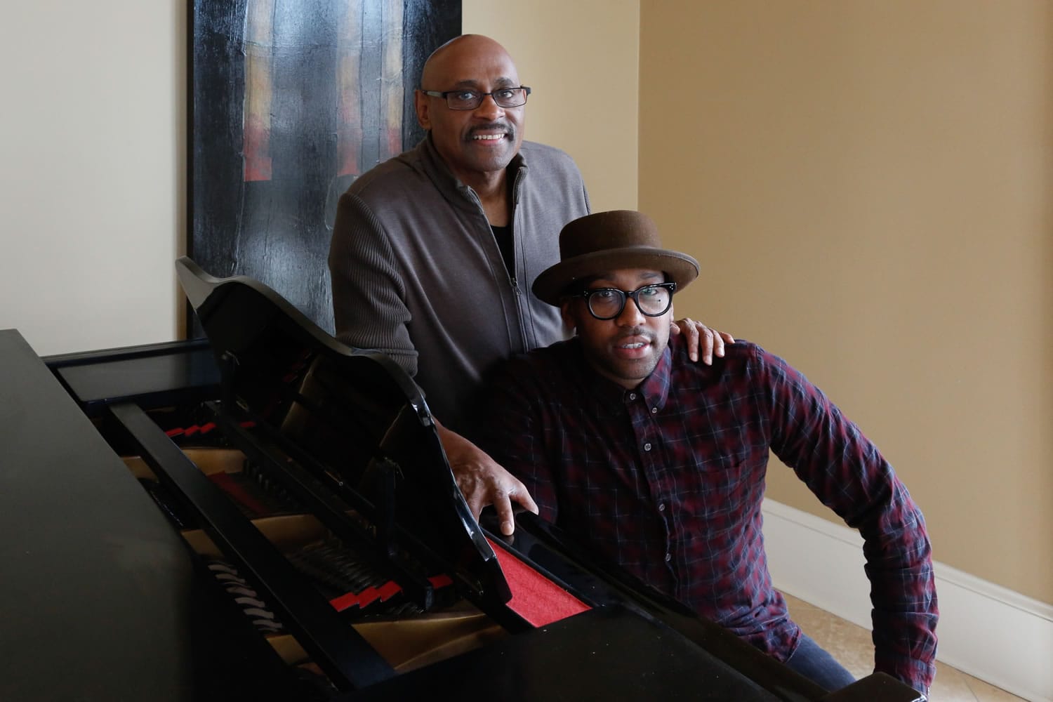 Bishop Paul Morton, left, and his son PJ are Grammy nominees in best gospel album for the elder Morton's album, for which PJ wrote and produced four songs.