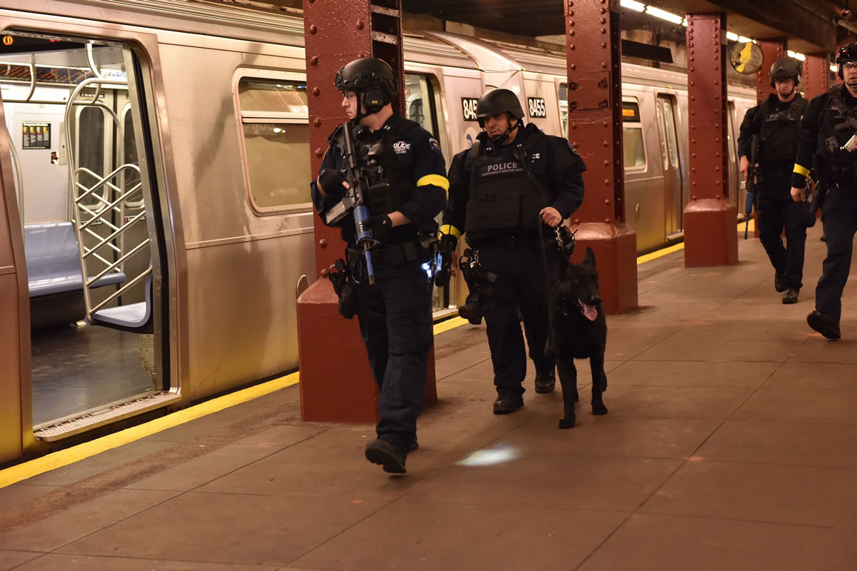 In an abandoned subway station in Lower Manhattan, police stage a drill simulating a terrorist attack Sunday in New York.