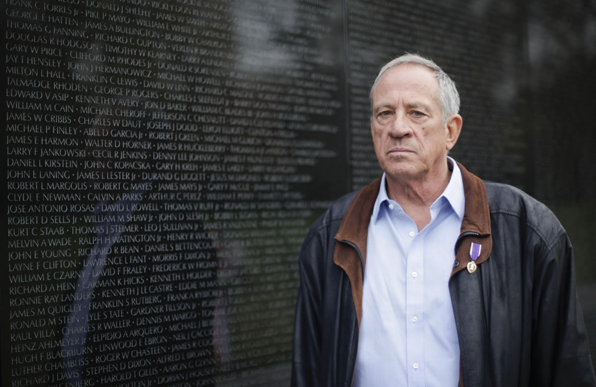 Jan C. Scruggs, visits the Vietnam Veterans Memorial in Washington on Monday. Scruggs, who led efforts to build the memorial on the National Mall, is calling for a national memorial for Iraq and Afghanistan veterans, even though violence in those countries is still claiming the lives of service members.