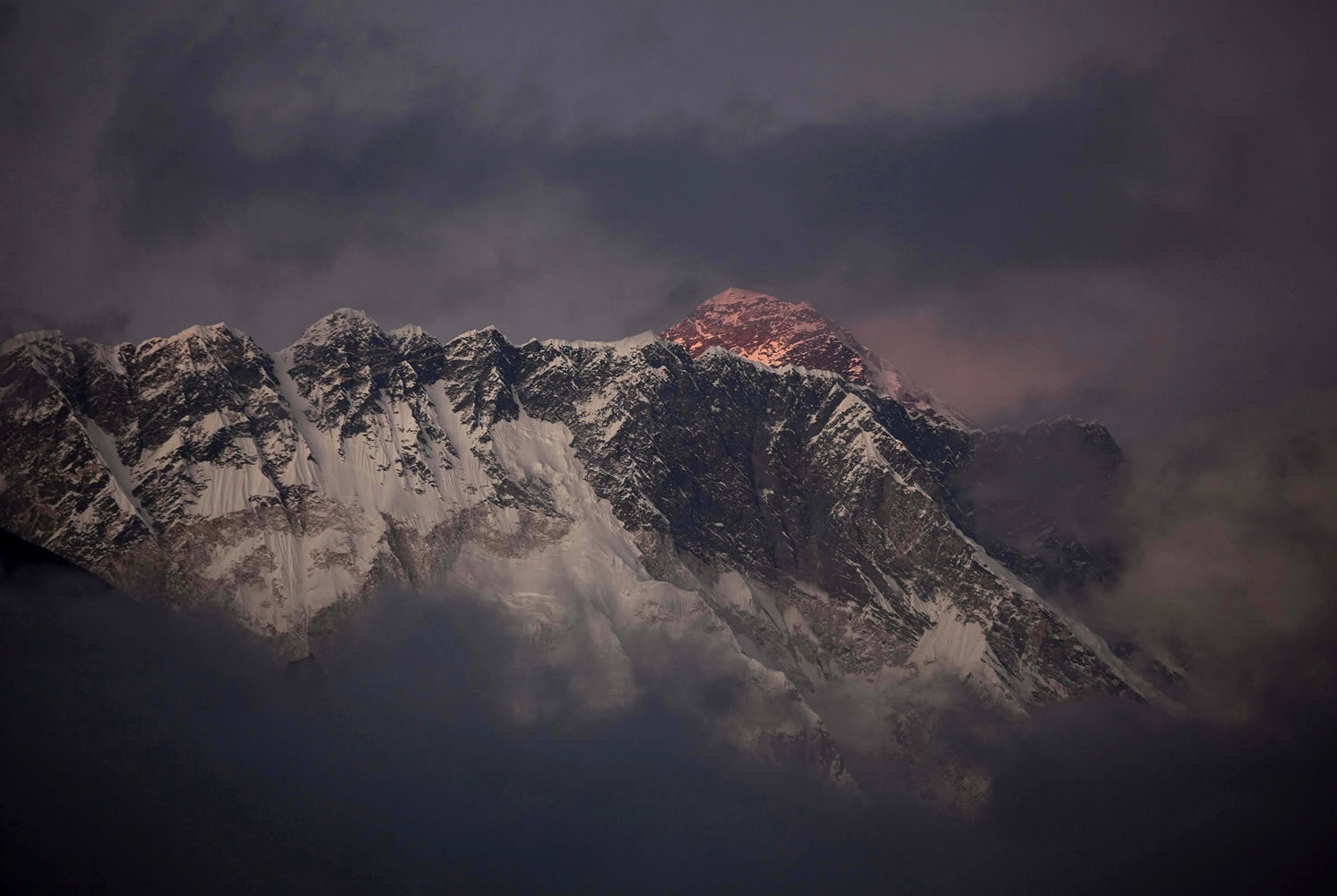 The last light of the day illuminates Mount Everest as seen from Tengboche, Nepal, in 2011.
