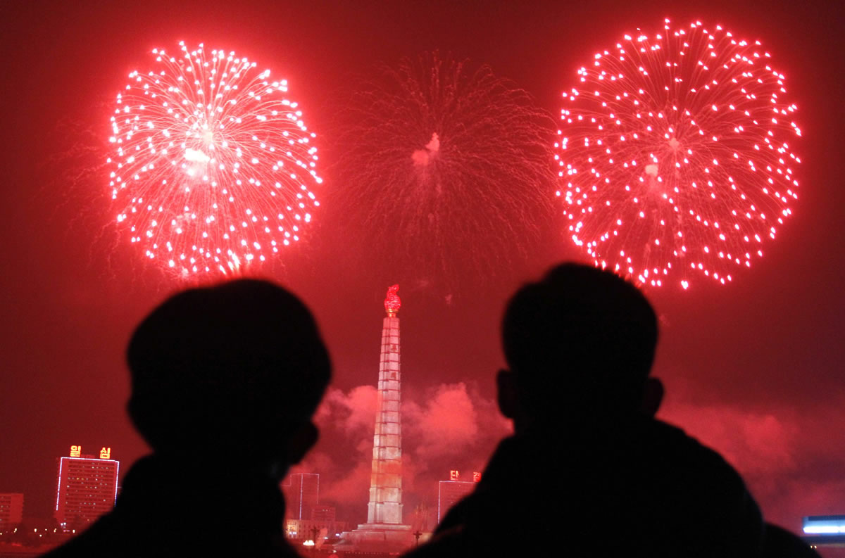Fireworks explode over Juche Tower and the Taedong River in Pyongyang, North Korea, to celebrate the New Year on Wednesday.