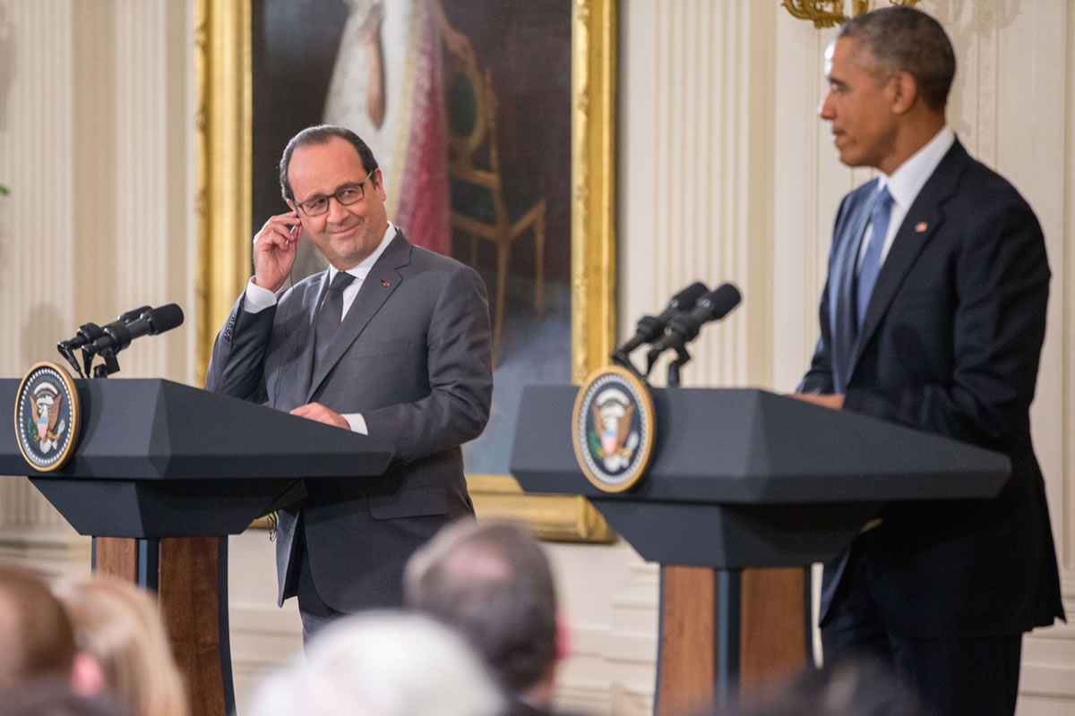 President Barack Obama and French President Francois Hollande participate in a news conference in the East Room of the White House in Washington on Tuesday. Hollande&#039;s visit to Washington is part of a diplomatic offensive to get the international community to bolster the campaign against the Islamic State militants.