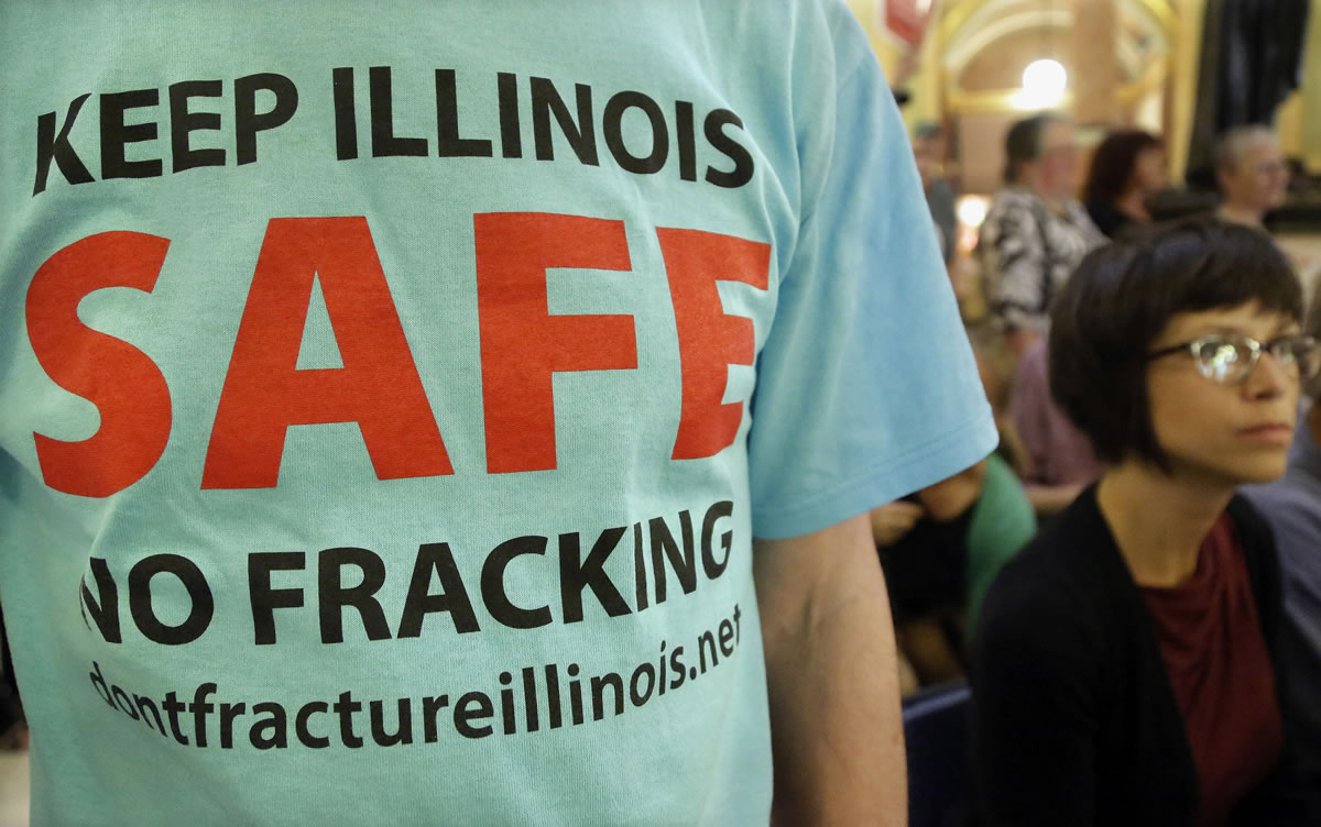 A protester attends a rally after a House Committee hearing on oil drilling, or &quot;fracking,&quot; legislation at the Illinois State Capitol in Springfield, Ill., in September.