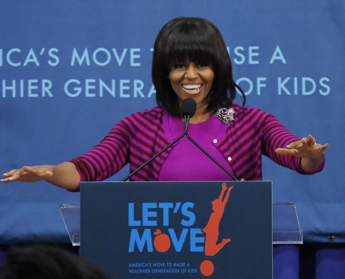 First lady Michelle Obama speaks at a &quot;Let's Move!&quot; program for 400 children at the Eastside and Northside Elementary Schools in Clinton, Miss., in February.