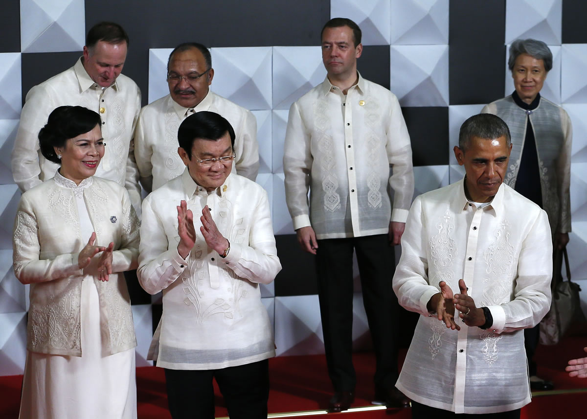 President Barack Obama gathers with APEC leaders for an official photo Wednesday in Manila, Philippines.