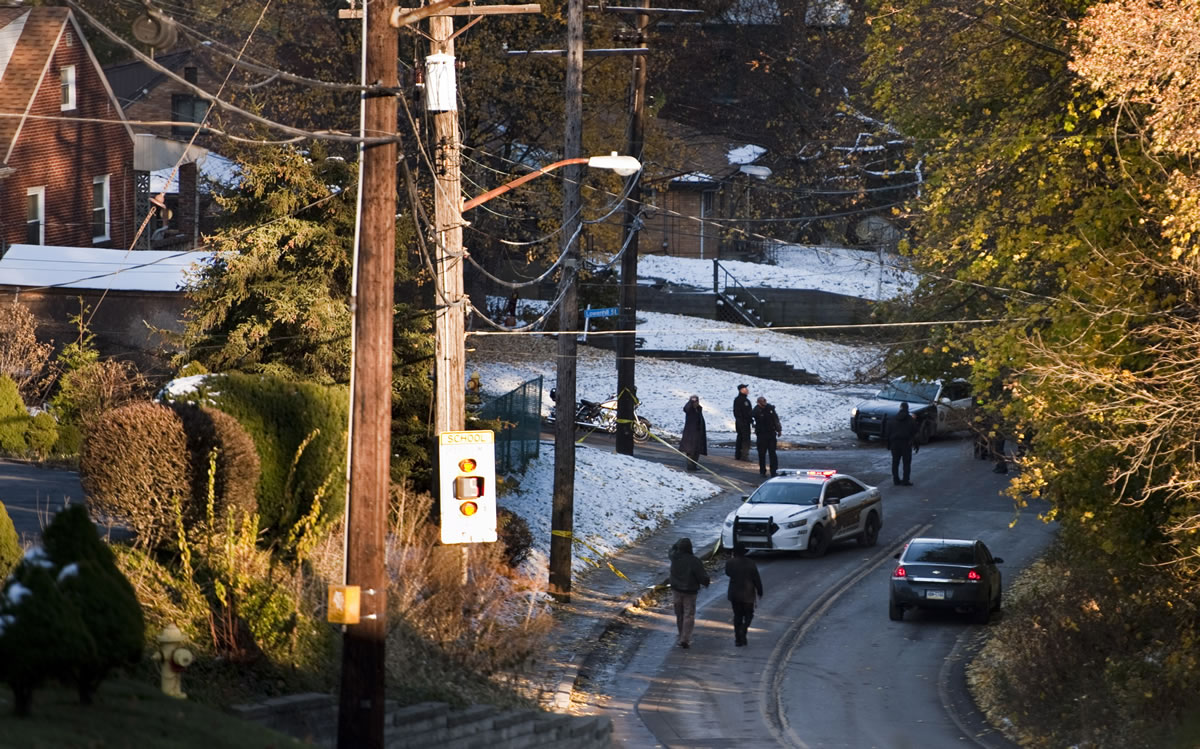 Police are seen in an area near Brashear High School in PIttsburgh on Wednesday.