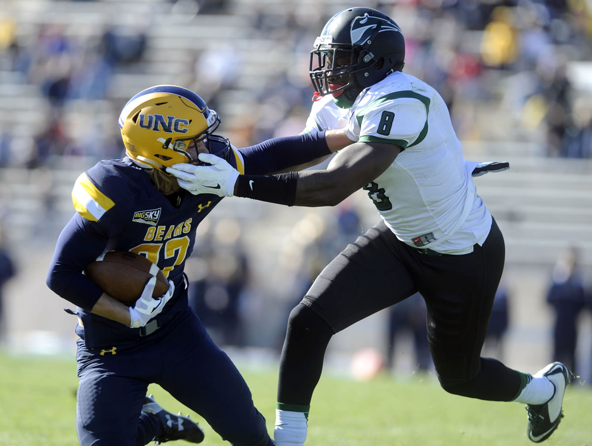 Northern Colorado's Trae Riek, left, is knocked down by Portland State's Patrick Onwuasor during an NCAA college football game, Saturday, Nov. 7, 2015, at Nottingham Field in Greeley, Colo.