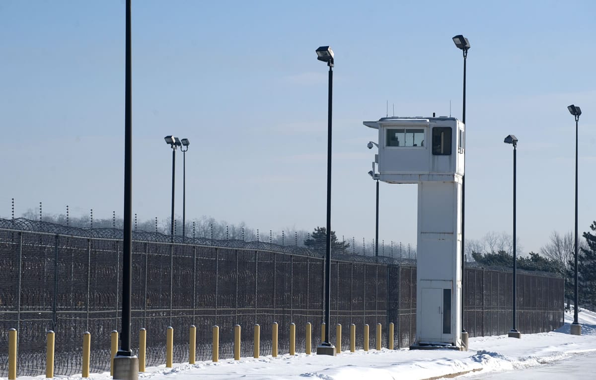 A guard tower stands over fencing at the Ionia Correctional Facility on Monday.