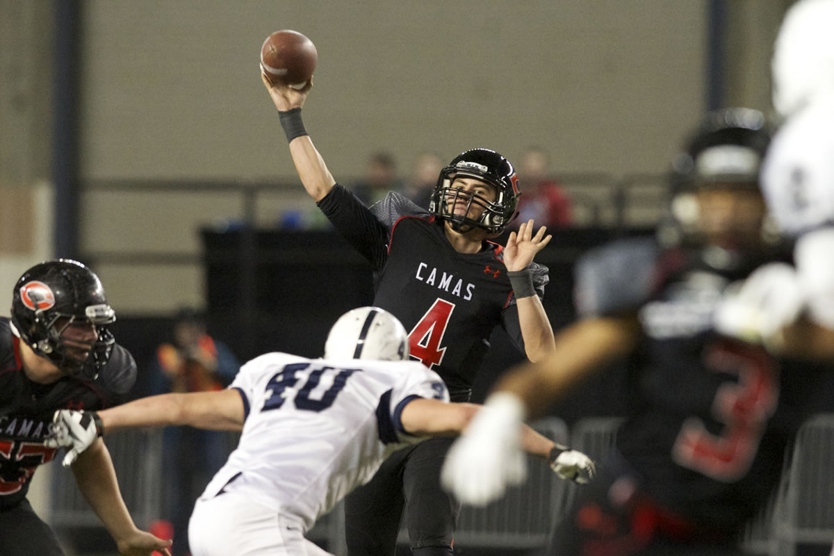 Camas quarterback Reilly Hennessey passes against Chiawana in the 2014 Class 4A state championship game in Tacoma.