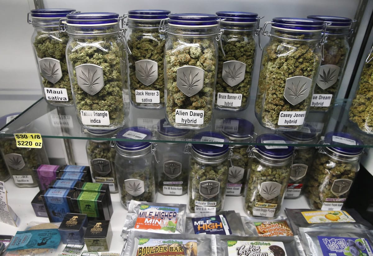 Marijuana and cannabis-infused products are displayed for sale at Medicine Man marijuana dispensary, which is to open as a recreational retail outlet at the start of 2014, in Denver. Colorado is making final preparations for marijuana sales to begin Jan.