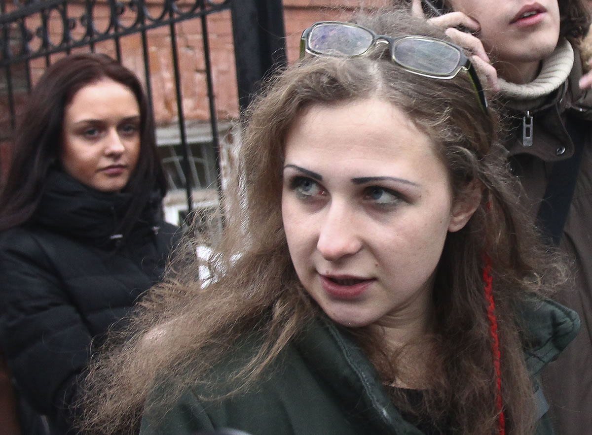 Maria Alekhina, second from left, a member of the Russian punk band Pussy Riot speaks to the media at the Committee against Torture after being released from prison, in Nizhny Novgorod, Russia, on Monday.