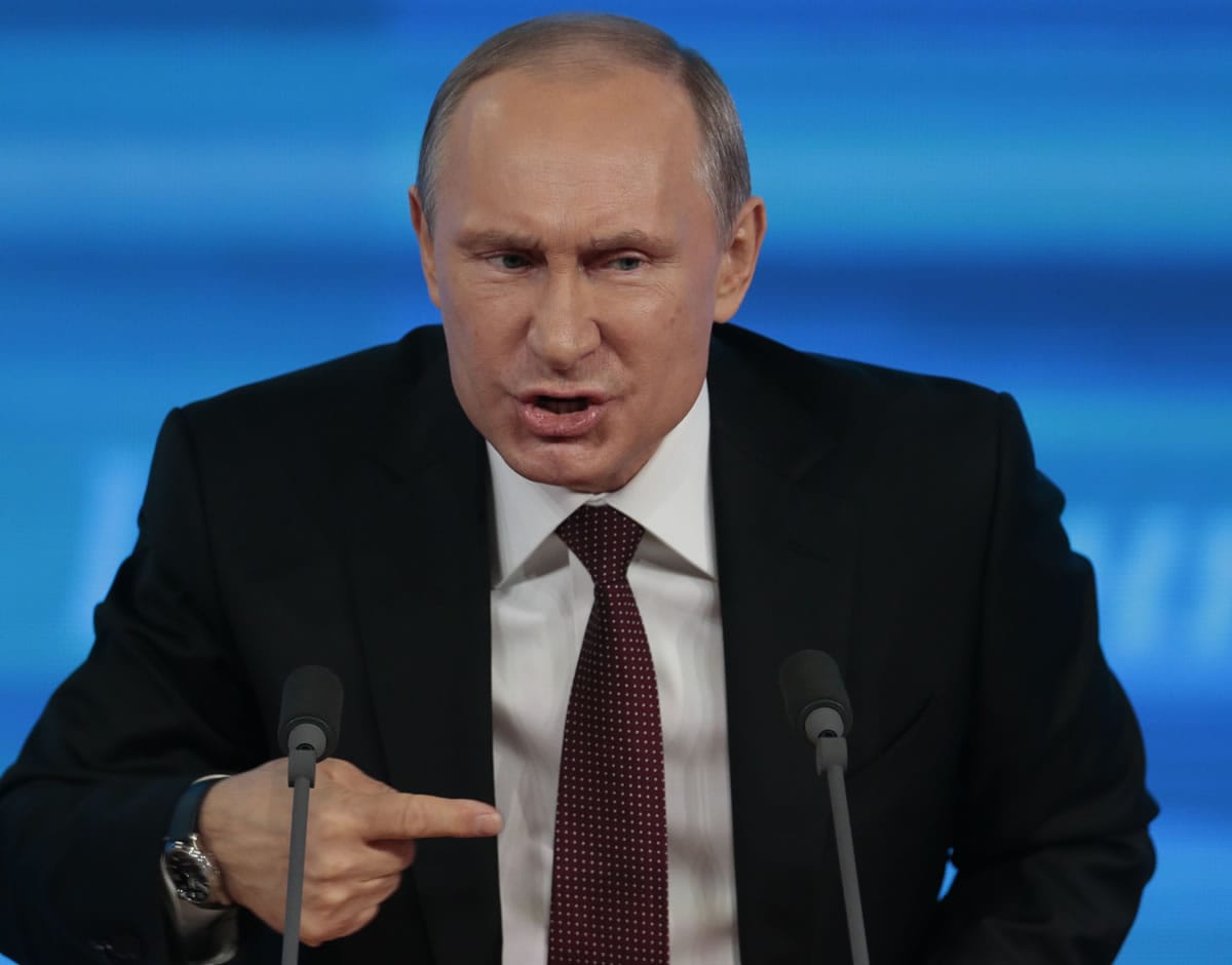 Russian President Vladimir Putin gestures while speaking at his annual news conference in Moscow, Russia, on Dec.