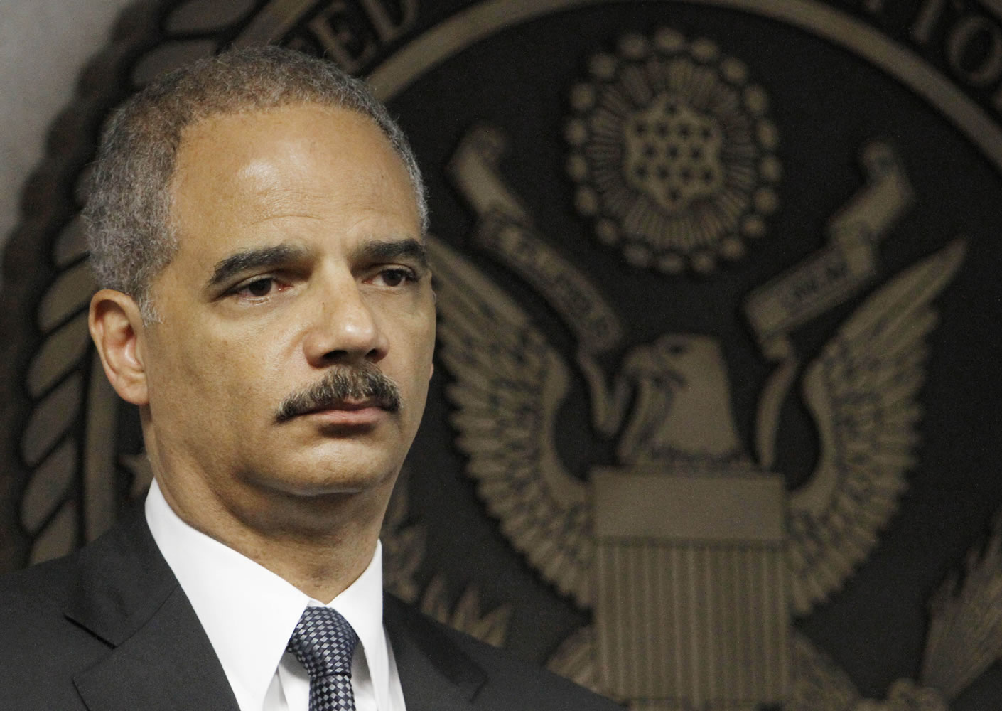 Attorney General Eric Holder takes part in news conference in Miami.