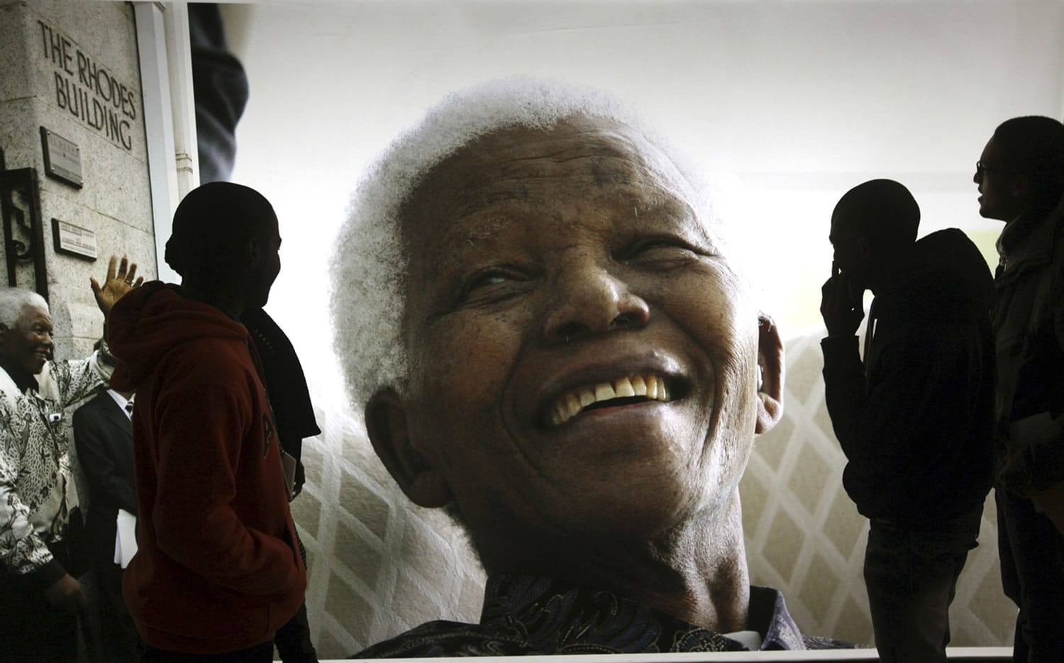 Giant photographs of former South African President Nelson Mandela are displayed at the Nelson Mandela Legacy Exhibition at the Civic Centre in Cape Town, South Africa.