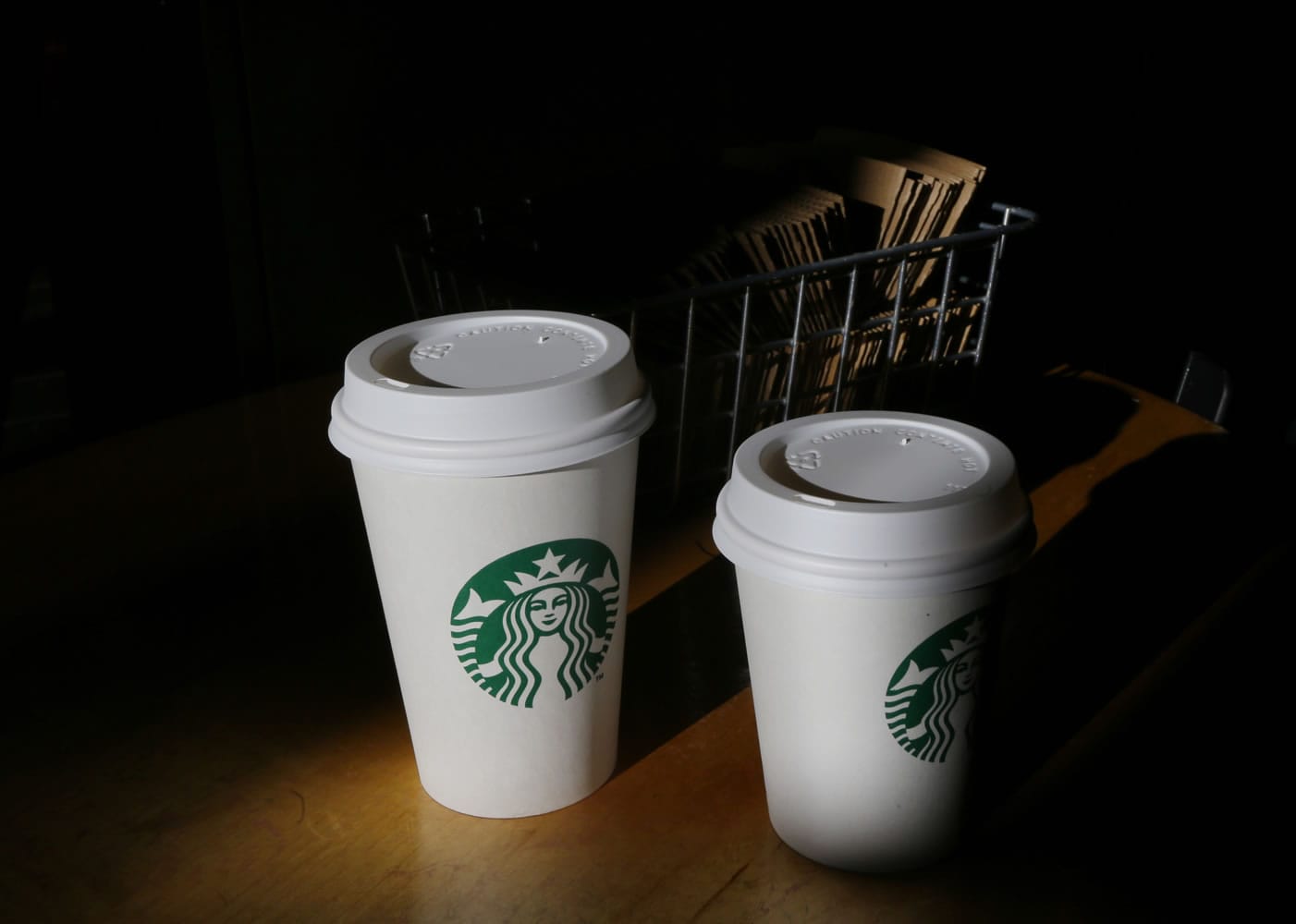 An arbitrator concluded on Tuesday that Starbucks must pay $2.76 billion to settle a dispute with Kraft over coffee distribution.