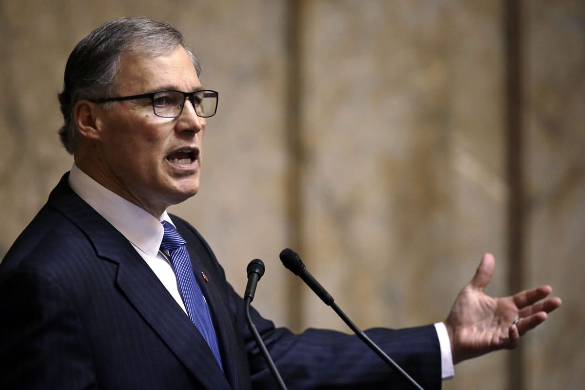 Gov. Jay Inslee speaks during the annual State of the State address to a joint session of the Legislature in the House chambers Jan.