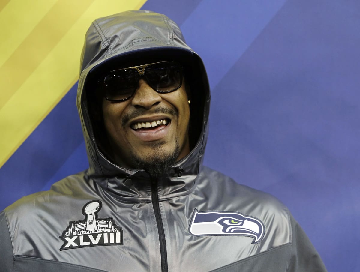 Seattle Seahawks' Marshawn Lynch smiles during media day for the NFL Super Bowl XLVIII football game Tuesday, Jan. 28, 2014, in Newark, N.J.