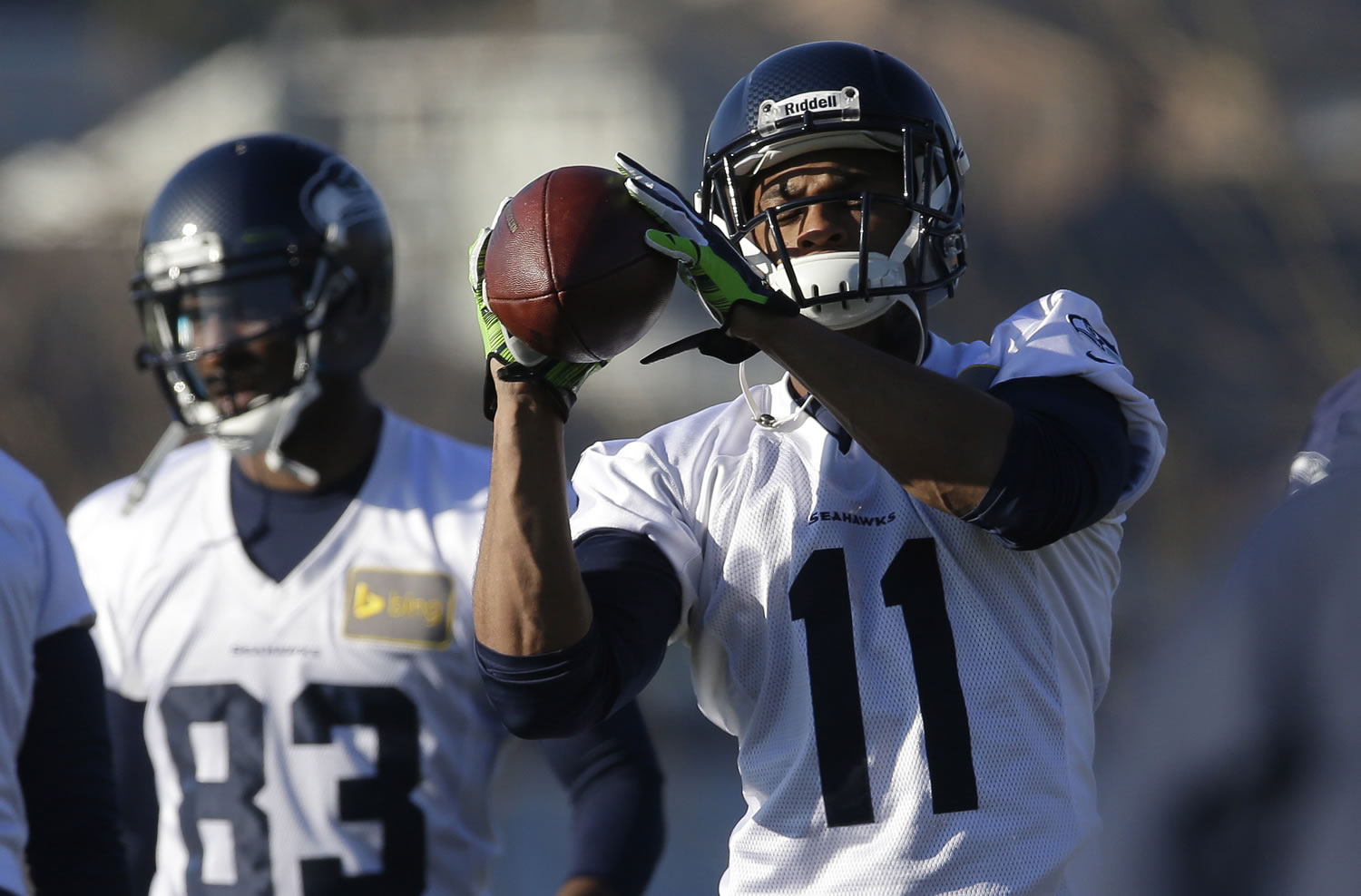 Seattle Seahawks wide receiver Percy Harvin (11) catches the football during warm-up drills before practice on Thursday in Renton. The Seahawks will play the Denver Broncos Feb. 2, 2014 in the Super Bowl. (AP Photo/Ted S.