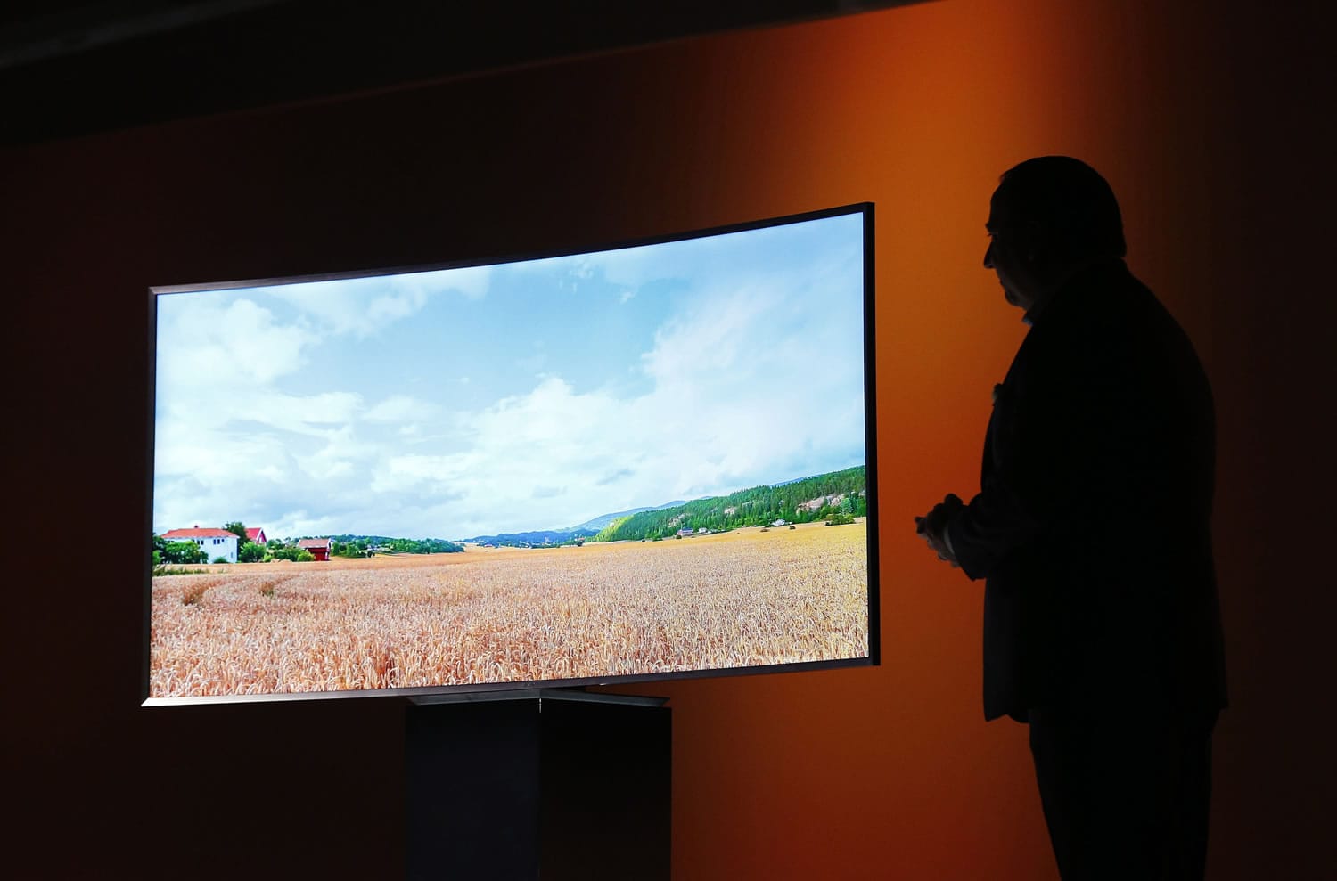 Joe Stinziano of Samsung Electronics America introduces a Samsung SUHD 4K TV on Jan. 5 in Las Vegas. The ultra-high definition picture standard, also called 4K, has four times the pixels of HD (1080p). But do you need it?