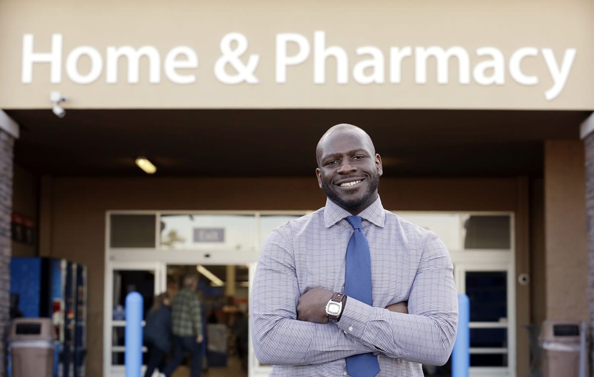 James Lott stands Nov. 21 outside the Wal-Mart store where he works as a pharmacist in Bonney Lake. Lott, who lives in Renton, a suburb of Seattle, adds significantly to his six-figure job salary by day-trading stocks. It's not just the wealthiest 1 percent: Fully 20 percent of U.S. adults become rich for parts of their lives, wielding outsized influence on America's economy and politics. And this little-known group may pose the biggest barrier to reducing the nation's income inequality. While the growing numbers of the U.S.