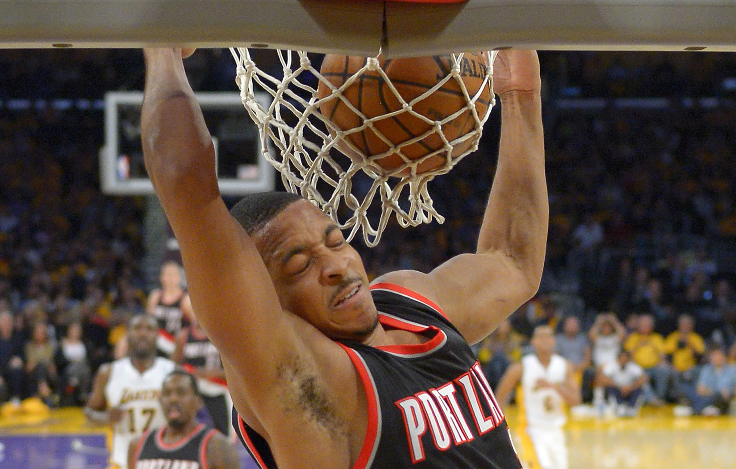 Portland Trail Blazers guard C.J. McCollum dunks during the second half of an NBA basketball game against the Los Angeles Lakers, Sunday, Nov. 22, 2015, in Los Angeles. The Trail Blazers won 107-93. (AP Photo/Mark J.