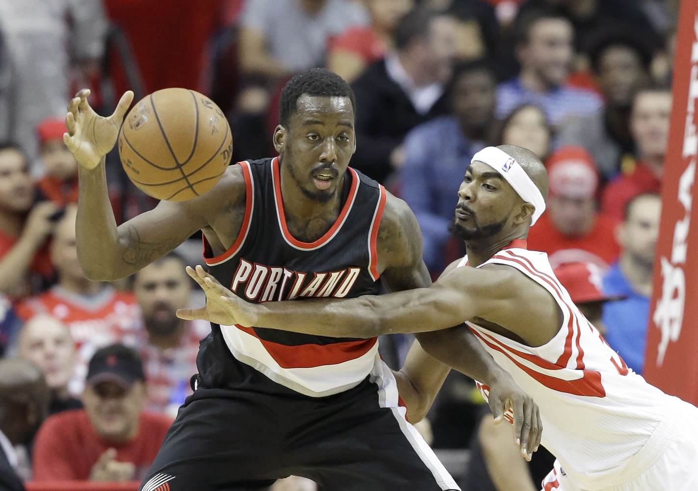 The Blazers’ Al-Farouq Aminu (left) is one of four NBA players with at least a 12.8 rebound percentage and taking more than 40 percent of their shots from 3-point range.