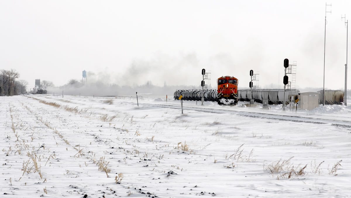 Crude oil tanker cars continue to burn at the site of an oil train derailment Tuesday near Casselton, N.D. The train carrying crude oil derailed and exploded on Monday.