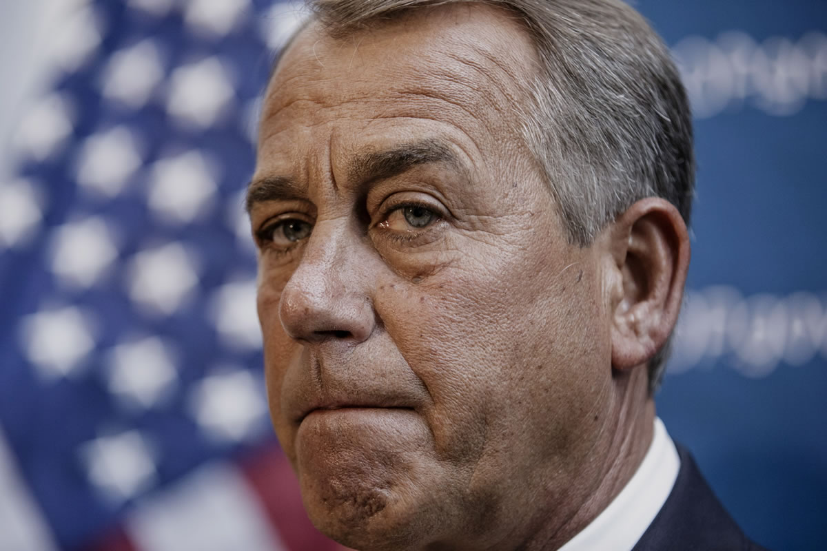 House Speaker John Boehner of Ohio, accompanied by House Republican leaders, pauses during a news conference on Capitol Hill in Washington on Jan.