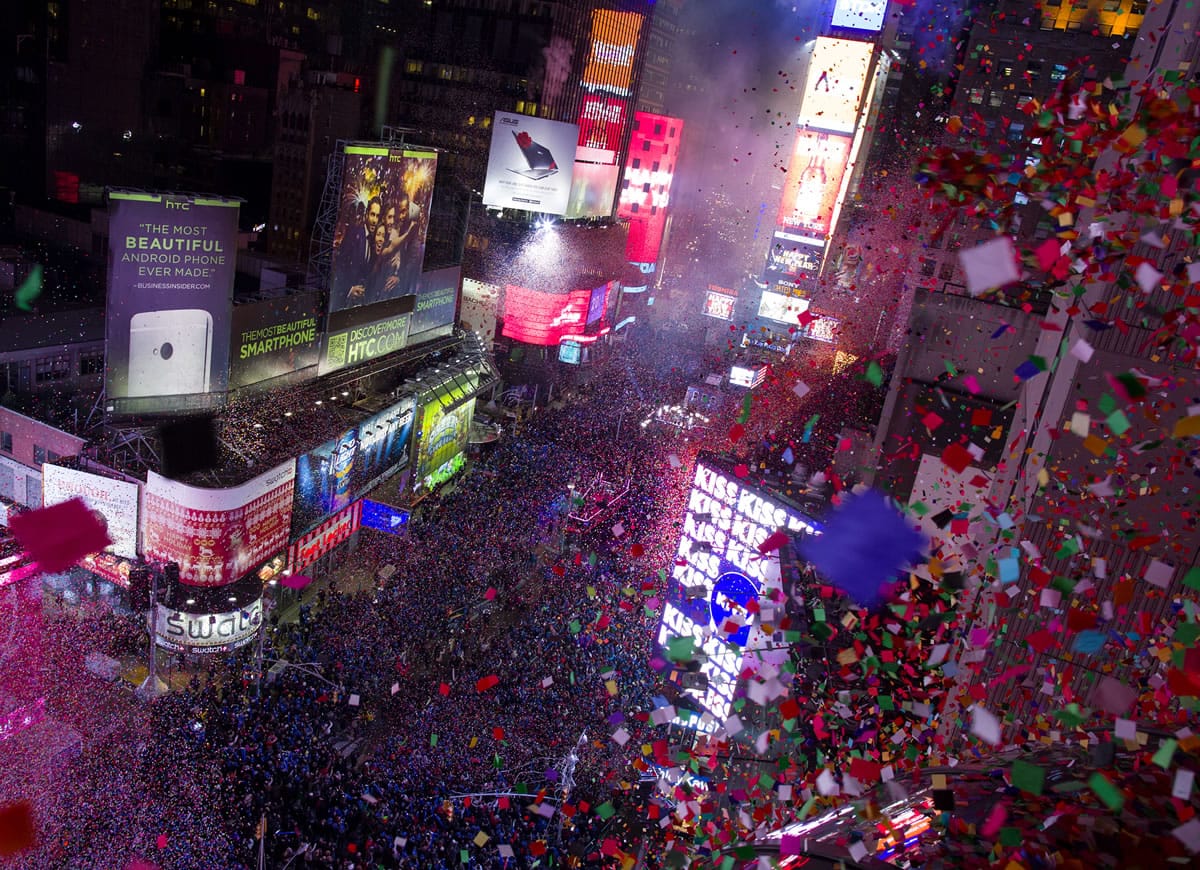 Confetti flies over Times Square in New York Wednesday, Jan.