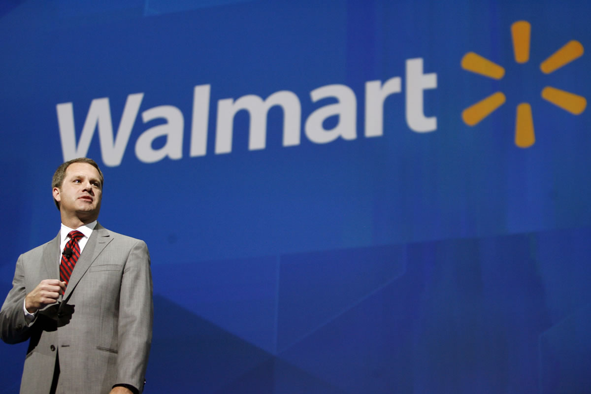 Doug McMillon, president and CEO of Wal-Mart International, speaks at the shareholders meeting in Fayetteville, Ark., in June. Wal-Mart Stores on Monday announced that CEO and President Mike Duke is stepping down from those posts, and McMillon has been named as his successor effective Feb.