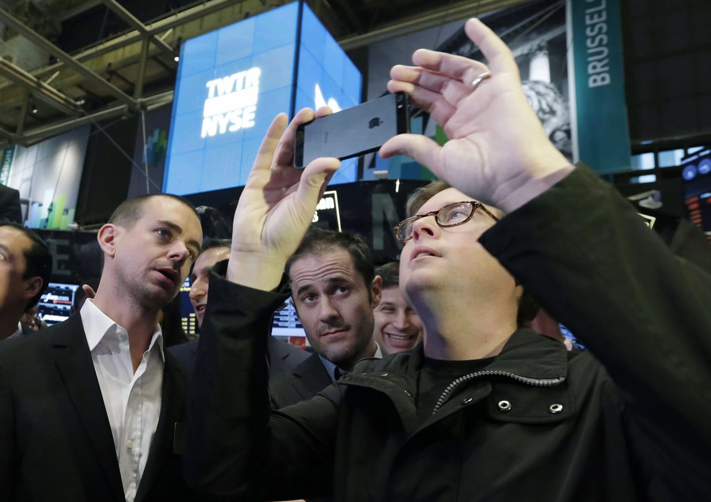 Twitter Chairman and co-founder Jack Dorsey, and co-founders Evan Williams and Biz Stone, wait for the opening bell to be rung at the New York Stock Exchange on Thursday.