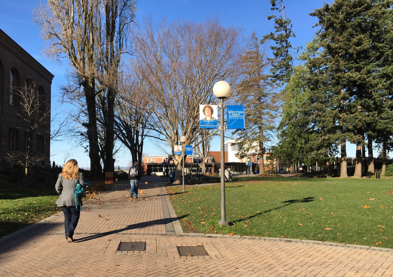 Students walk on the Western Washington University campus in Bellingham on Tuesday after classes were canceled because of threats over the weekend against minorities posted on YikYak, an anonymous social media platform populated by college students.