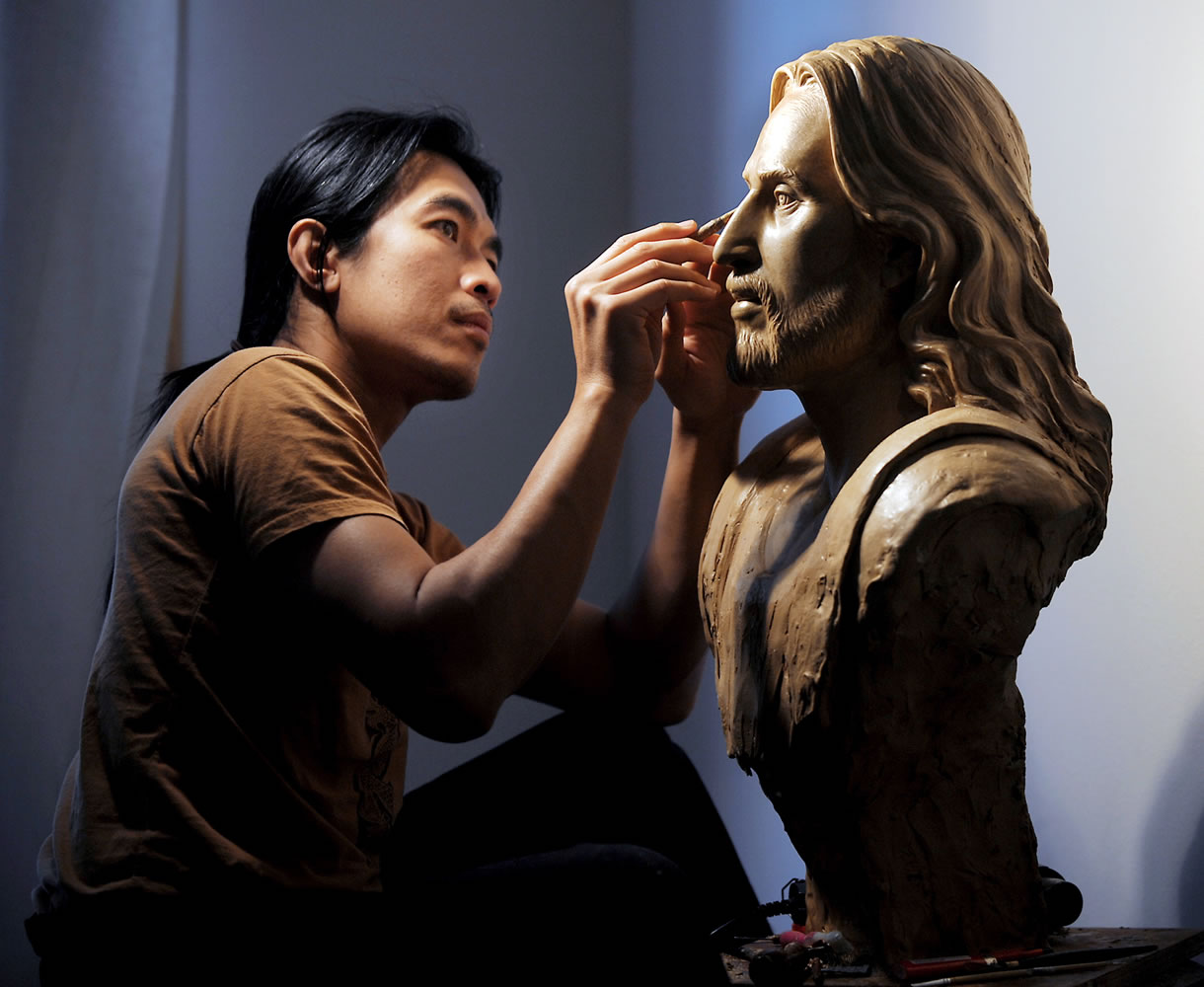 Sunti Pichetchaiyakul of Bigfork, Mont., works in his studio in 2011 on a wax sculpture of Jesus Christ based on the Shroud of Turin.