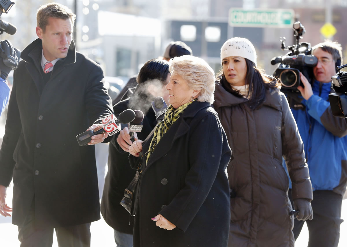 Patricia Donahue, wife of Michael Donahue, center, arrives for James &quot;Whitey&quot; Bulger's sentencing hearing at federal court in Boston on Wednesday.